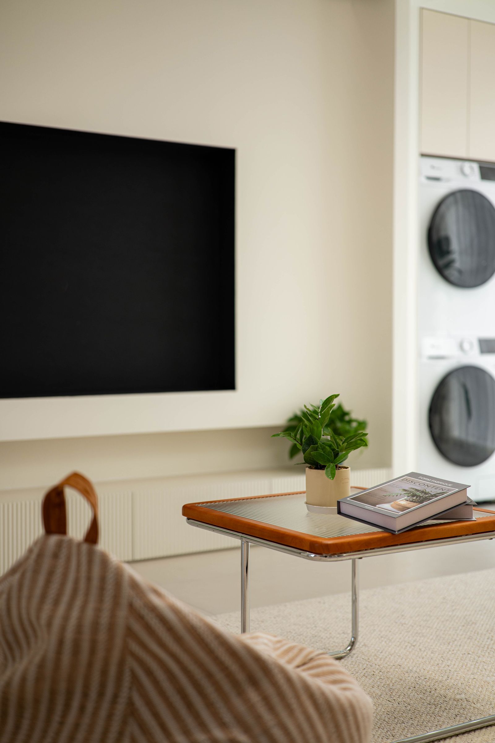 Modern living room with a smart TV in Mumbai Suburban