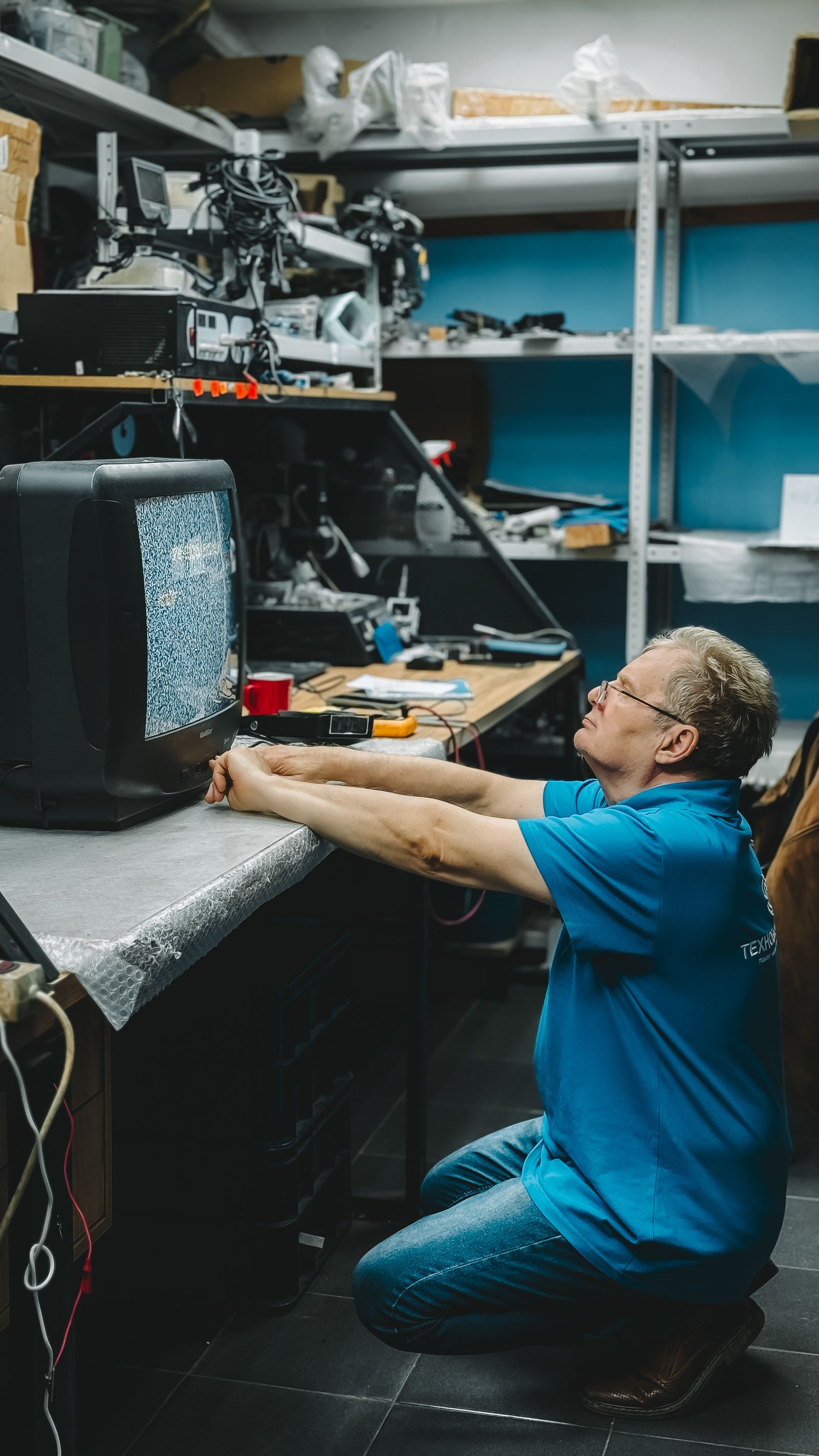 TV repair technician visiting a home in Cuffe Parade, Mumbai City
